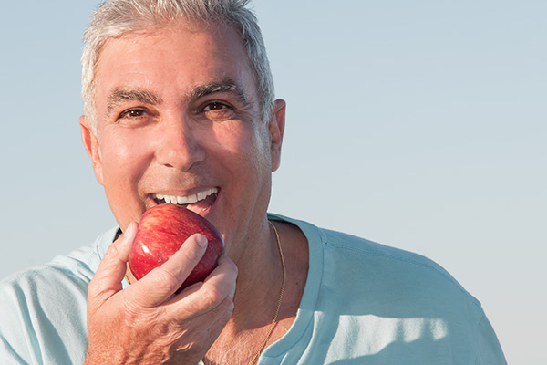 How Do Dentures Stay in Place? from Smiles On Michigan in Chicago, IL