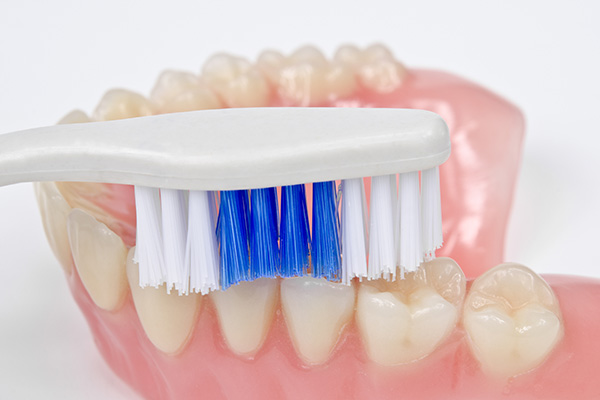 Preventing Bacteria Buildup on Dentures from Smiles On Michigan in Chicago, IL